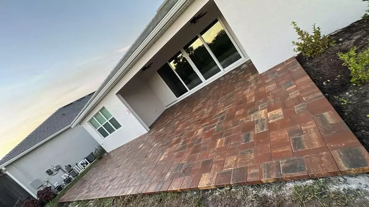 Brick paver back patio installed behind a home in Bradenton, Florida