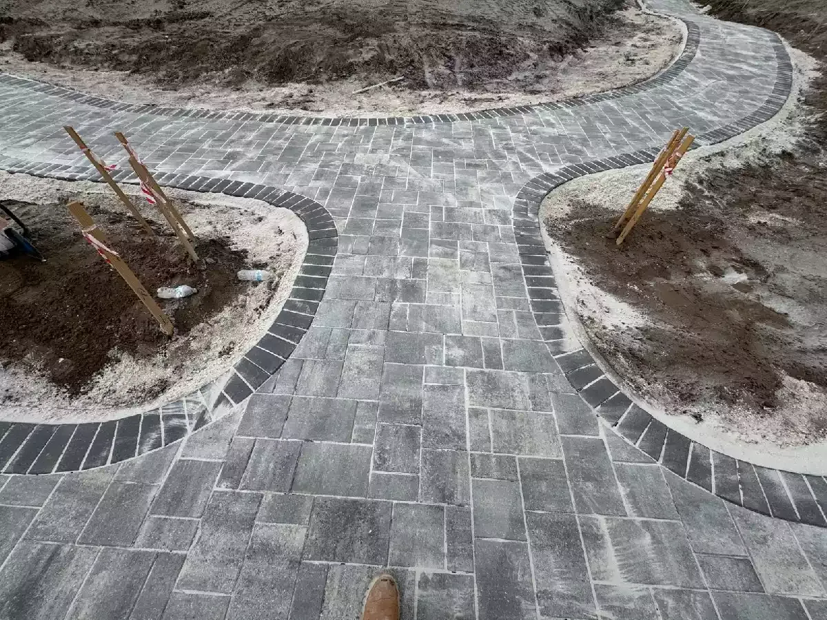 Curved concrete paver walkway at a commercial site in North Port, Florida