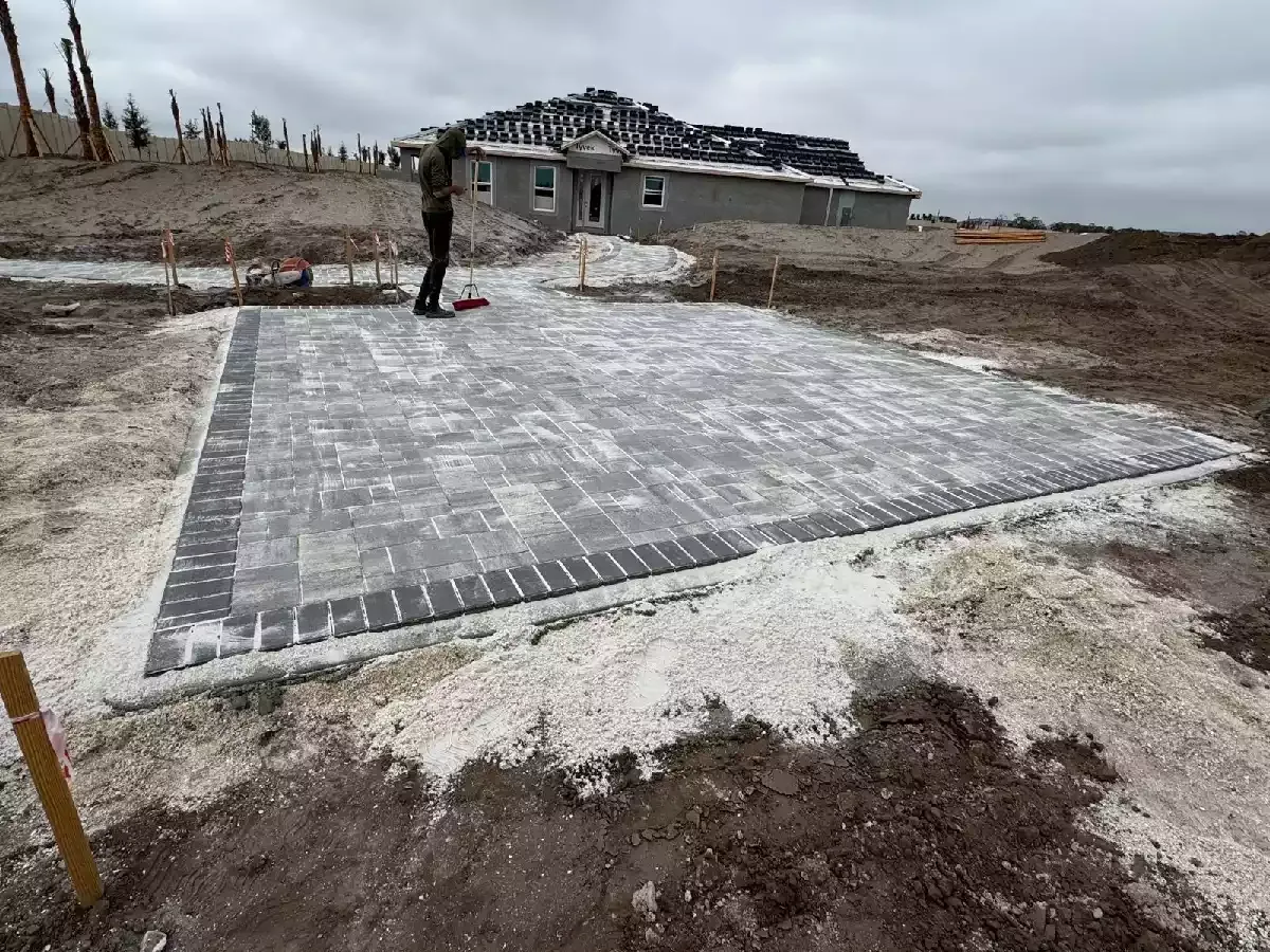 Concrete paver gathering area with border detail at a North Port, Florida commercial site