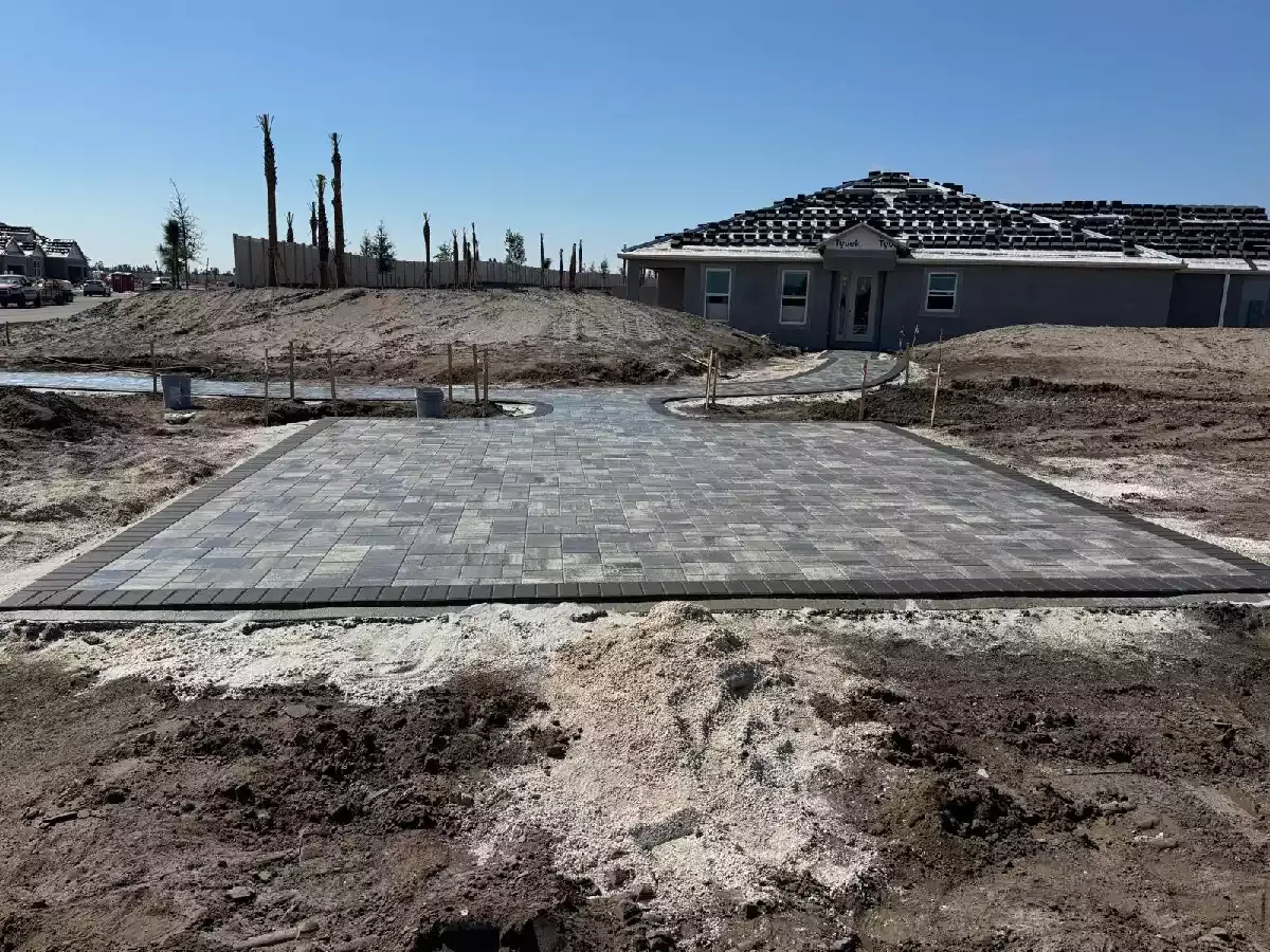 Completed concrete paver patio and border at a commercial property in North Port, Florida