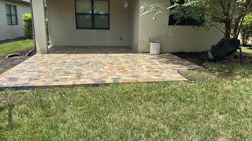 Paver patio extension behind a Wellen Park home in North Port, Florida